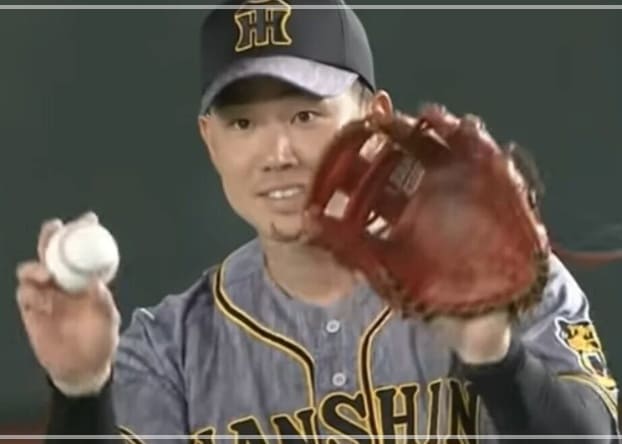 グローブを持つ糸原